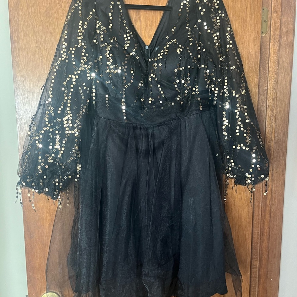 Short black dress with gold sequins